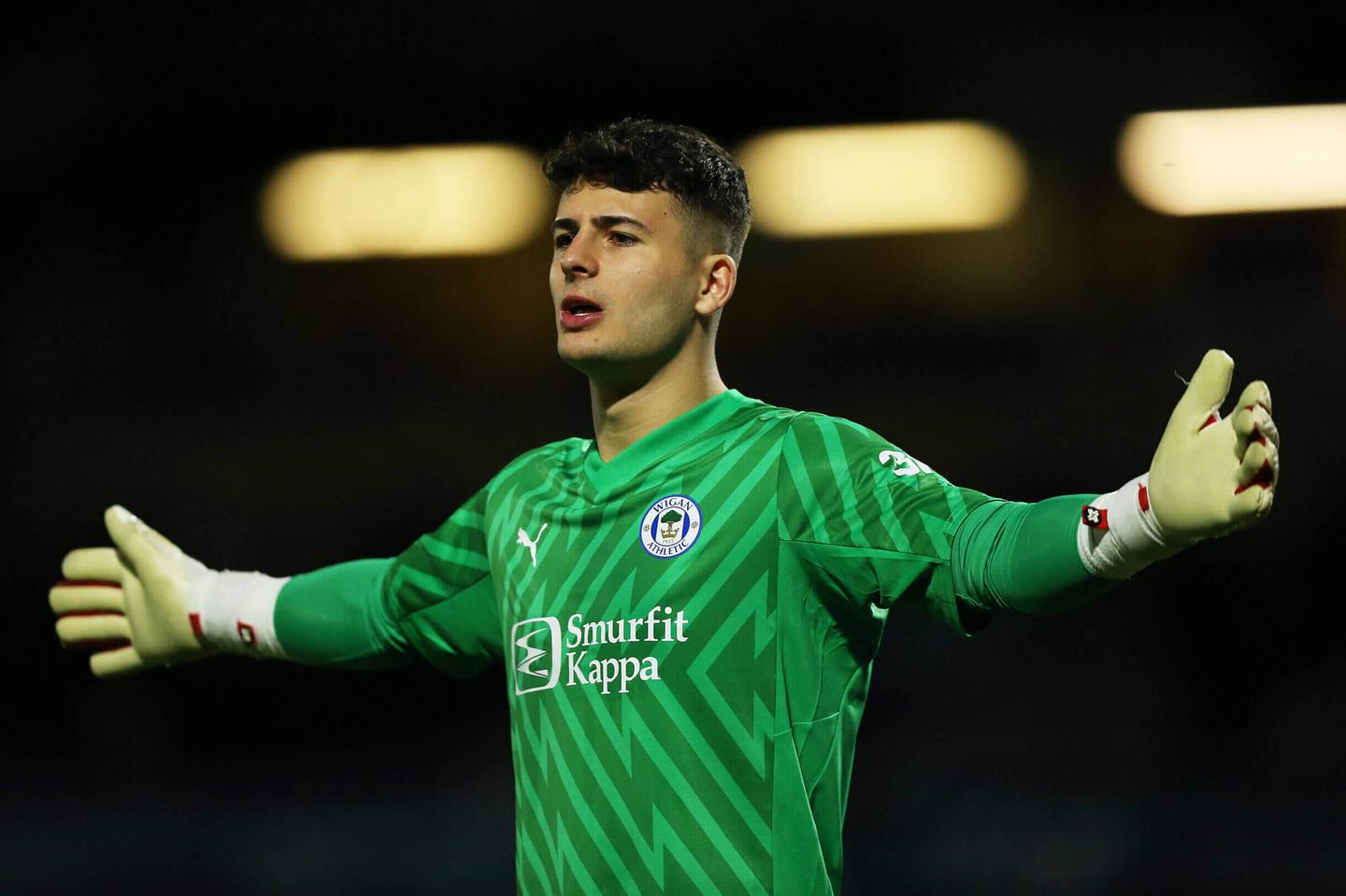 Arsenal Pursues Wigan Goalkeeper Sam Tickle