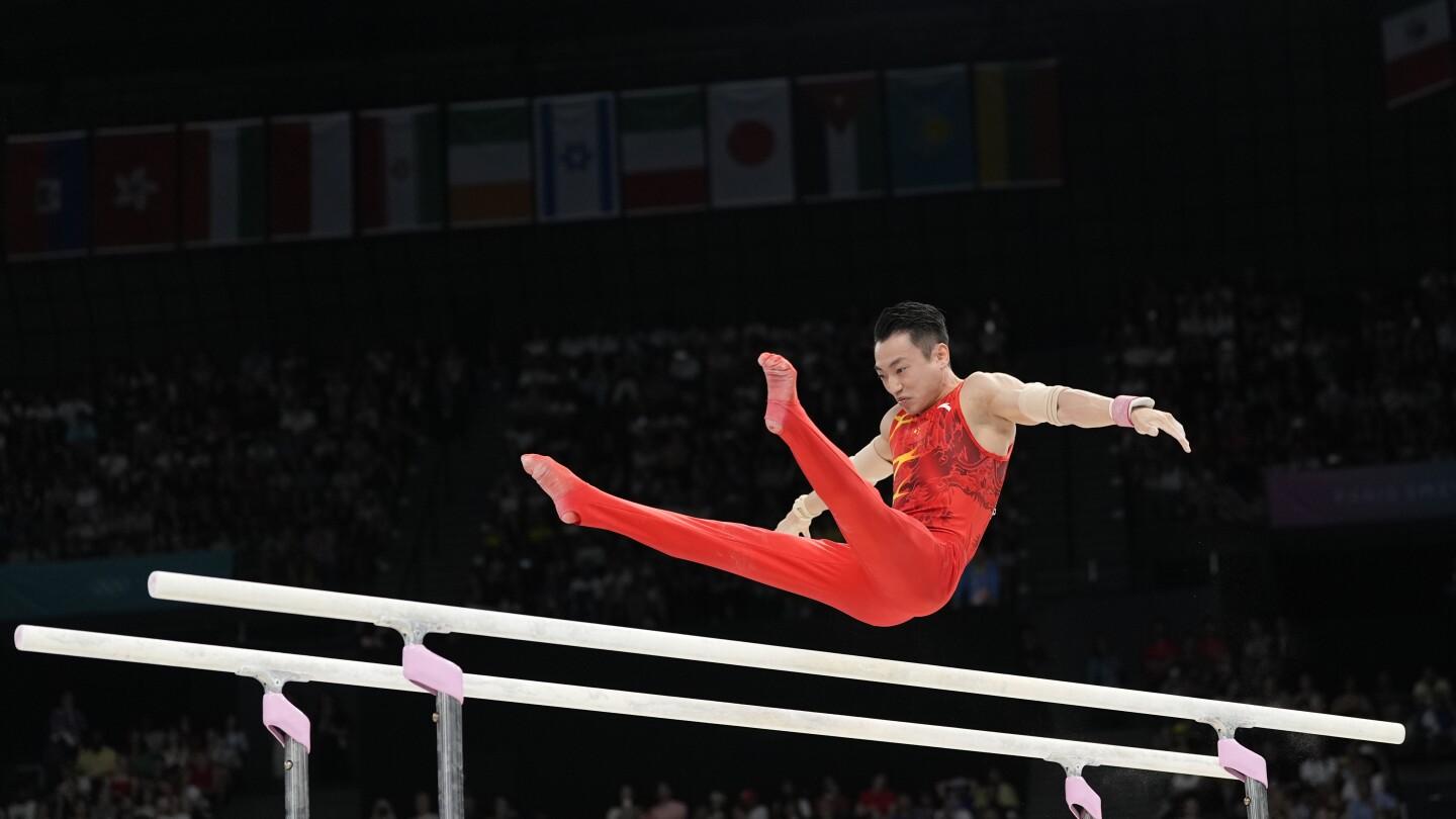 Zou Jingyuan Defends Olympic Parallel Bars Title