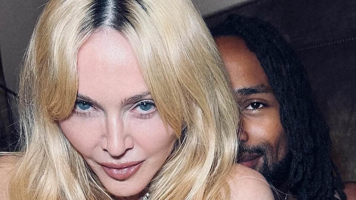 Madonna Shares Risque Photos with Mystery Companion