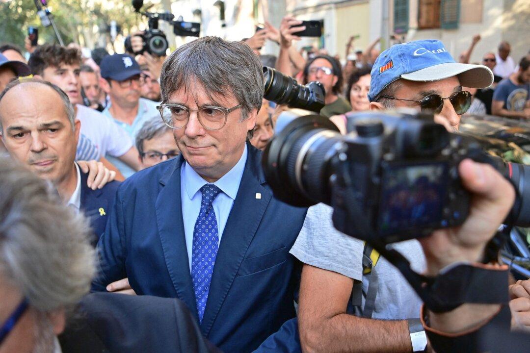 Carles Puigdemont Evades Arrest in Barcelona